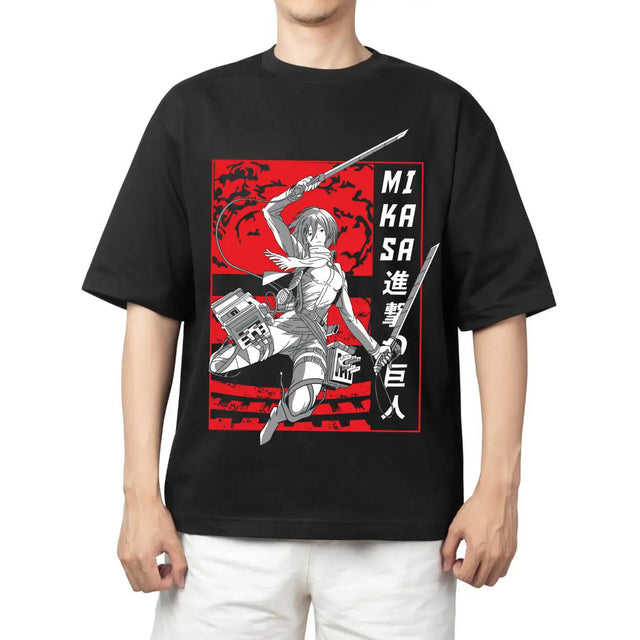 Here at Everythinganimee we only have the best shirts in the world! Embrace the strength and resilience of Mikasa Ackerman with this powerful tee inspired by Attack on Titan. The intense red and black design highlights Mikasa in action, wielding her dual blades, ready to take down any threat.