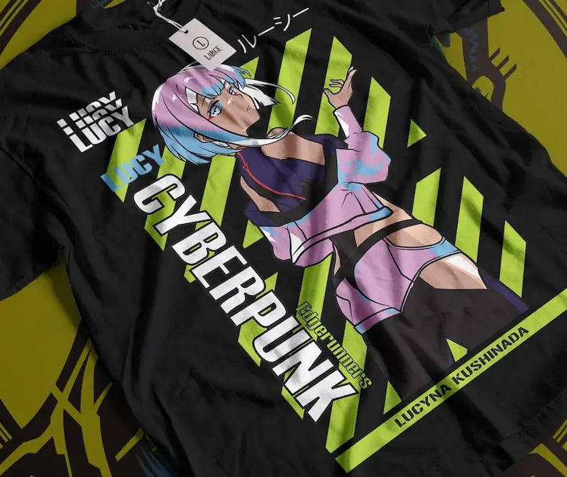 Here at Everythinganimee we have the best anime shirts in the world.
Step into the world of Cyberpunk with this striking Lucy Kushinada tee, featuring bold colors and a futuristic design that captures her fierce energy.