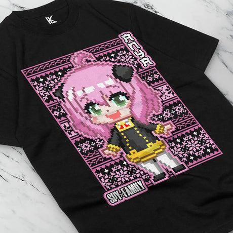 Here at Everythinganimee we have the best anime shirts in the world.
Step into the world of SPY x FAMILY with this charming Pixel Anya tee, featuring Anya in an adorable pixel art design. This shirt combines style and comfort, crafted with premium materials for everyday wear.
