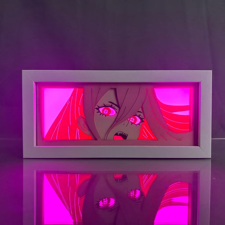 This lightbox captures the magic of Power & Pochita. If you're looking for more Chainsaw Man merch, we have it all! Check out our anime merch now—free shipping!
