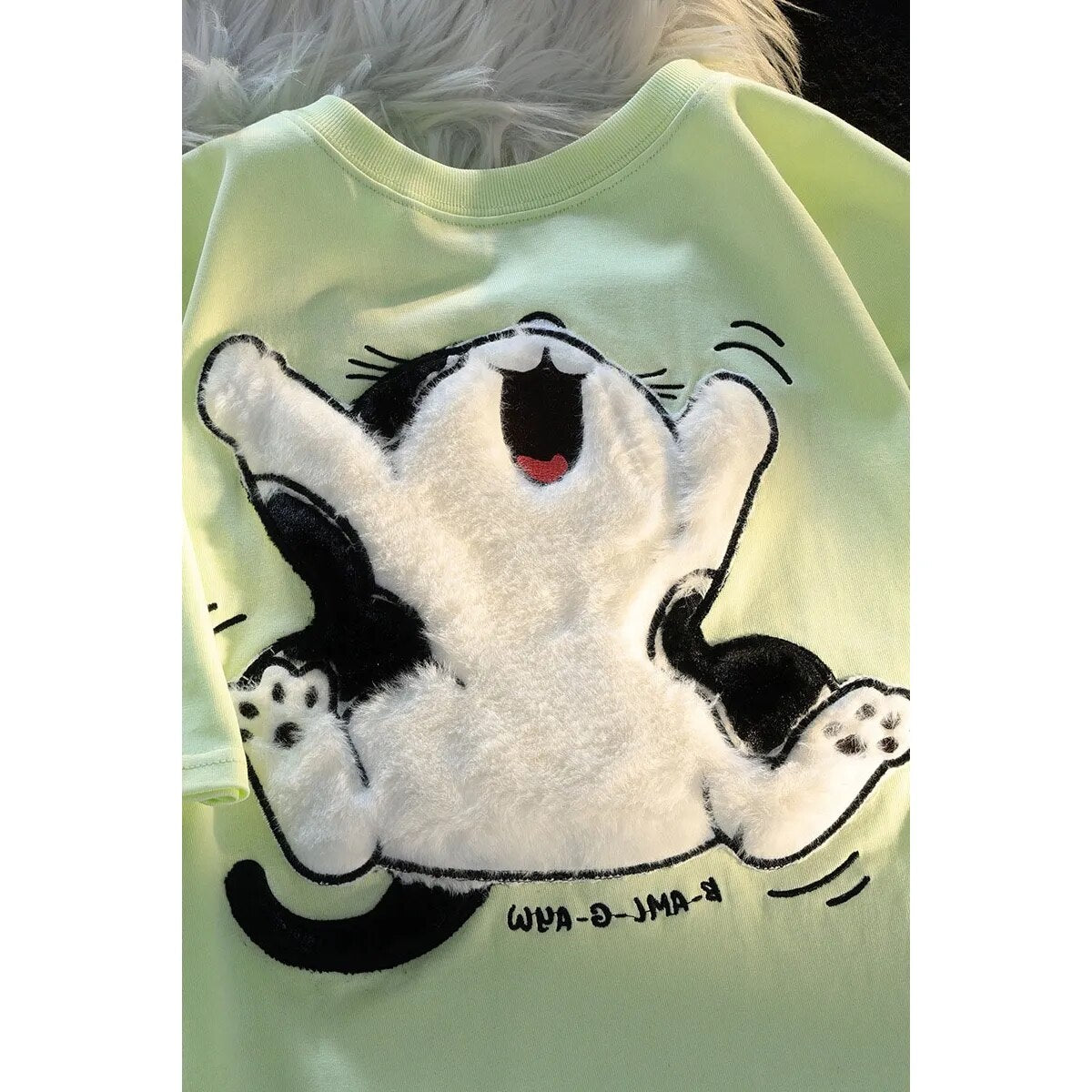 Dive into a world where cute meets comfort with our Cat Plush T-shirt. If you are looking for more Cat Anime Merch, We have it all!| Check out all our Anime Merch now!