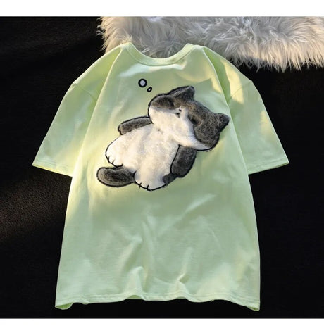 Dive into a world where cute meets comfort with our Cat Plush Embroidered T-shirt. If you are looking for more Cat Anime Merch, We have it all!| Check out all our Anime Merch now!