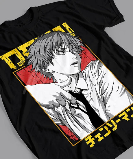 Here at Everythinganimee we have the best anime shirts in the world. Step into the world of Chainsaw Man with the fierce and bold Denji Strike Tee! Featuring Denji in his signature pose, this shirt captures the raw energy and determination of the character.