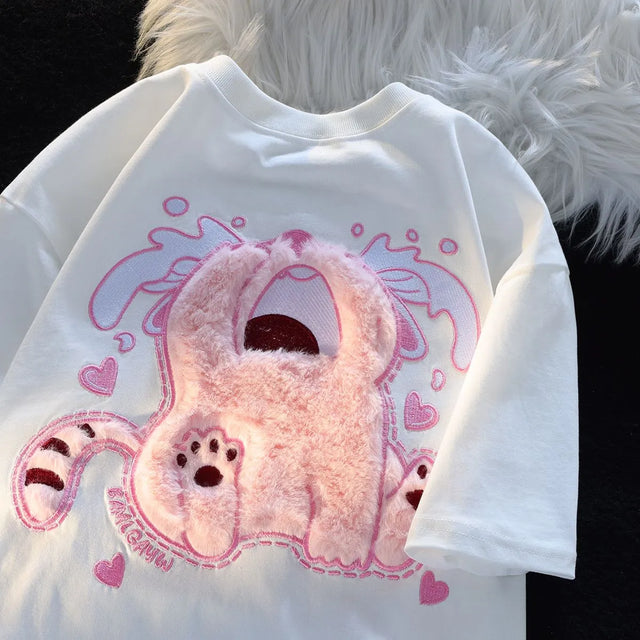 Dive into a world where cute meets comfort with our Kitten Plush T-shirt. If you are looking for more Kitten Anime Merch, We have it all!| Check out all our Anime Merch now!