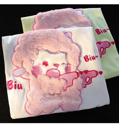 Dive into a world where cute meets comfort with our Lamb Plush T-shirt. If you are looking for more Lamb Anime Merch, We have it all!| Check out all our Anime Merch now!