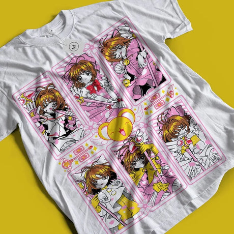 Here at Everythinganimee we only have the best shirts in the world! Embrace the magic with our stunning Cardcaptor Sakura Tee, featuring the beloved Sakura Kinomoto in her most iconic battle stances. This shirt captures the essence of Sakura's magical adventures, showcasing detailed and vibrant illustrations that will make any fan's heart flutter. Made from soft, breathable cotton,