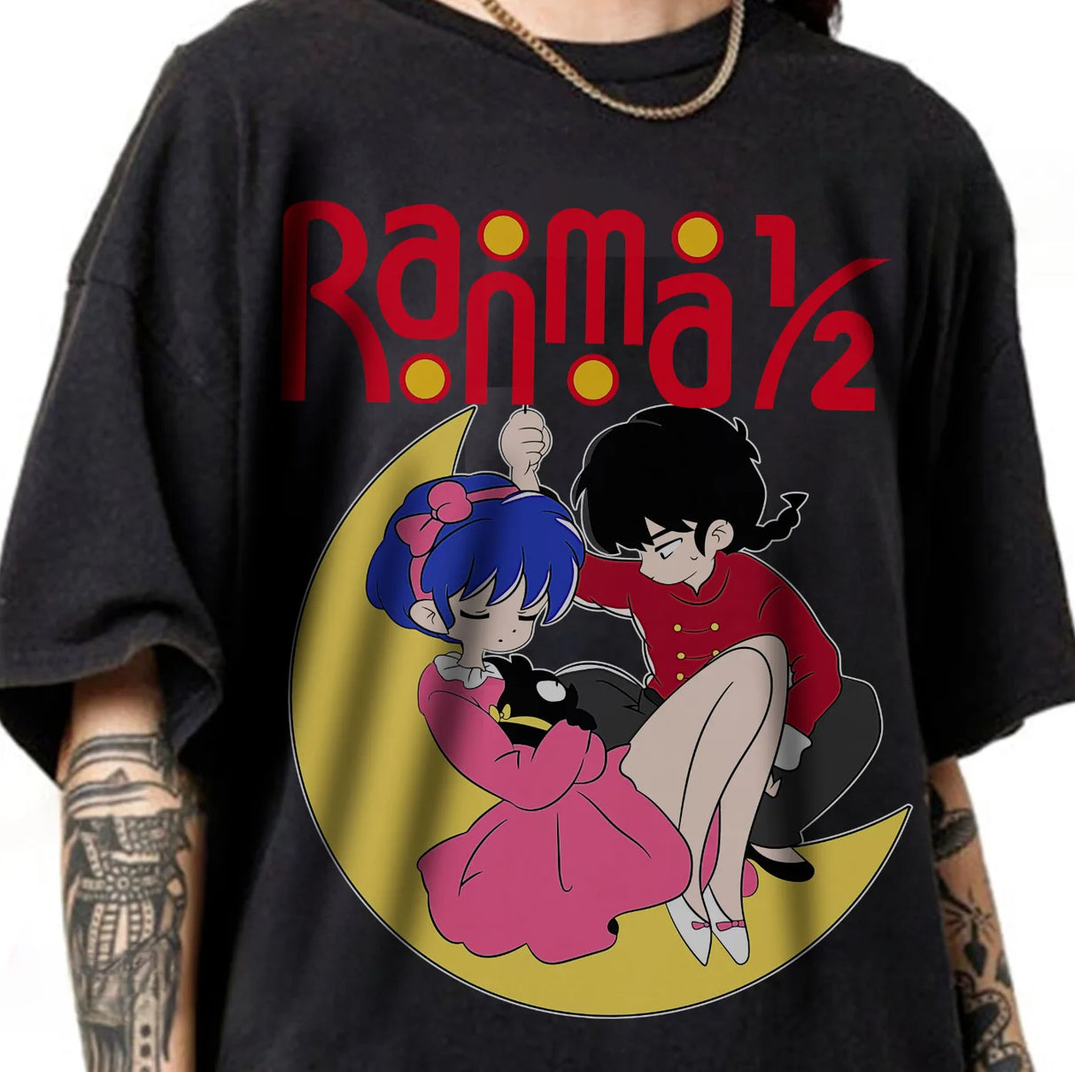 Here at Everythinganimee we have the best anime shirts in the world.
Celebrate the classic Ranma 1/2 with this charming tee featuring Ranma and Akane sitting on a crescent moon. A perfect piece for lovers of retro anime, this design combines nostalgia and style effortlessly.