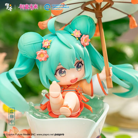 Explore Miku figure, adorned with floral patterns complementing a traditionally designed Japanese teacup. If you are looking for more Vocaloid, We have it all! | Check out all our Anime Merch now!