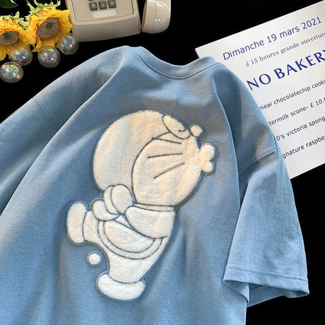This tee captures the magic of Doraemon. If you're looking for more Doraemon merch, we have it all! Check out our anime merch now—free shipping!