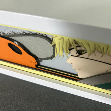 This lightbox captures the magic of Power & Pochita. If you're looking for more Chainsaw Man merch, we have it all! Check out our anime merch now—free shipping!