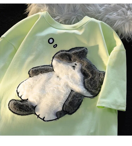 Dive into a world where cute meets comfort with our Cat Plush Embroidered T-shirt. If you are looking for more Cat Anime Merch, We have it all!| Check out all our Anime Merch now!