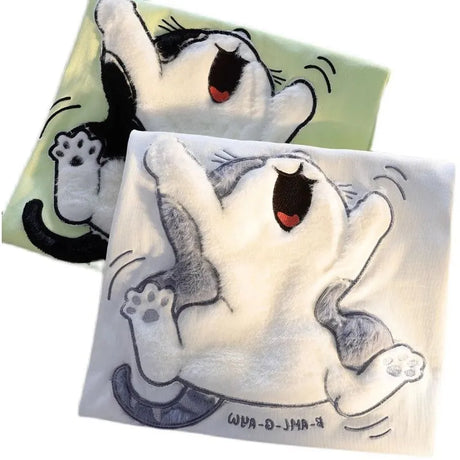 Dive into a world where cute meets comfort with our Cat Plush T-shirt. If you are looking for more Cat Anime Merch, We have it all!| Check out all our Anime Merch now!