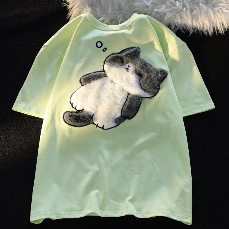 Dive into a world where cute meets comfort with our Cat Plush Embroidered T-shirt. If you are looking for more Cat Anime Merch, We have it all!| Check out all our Anime Merch now!