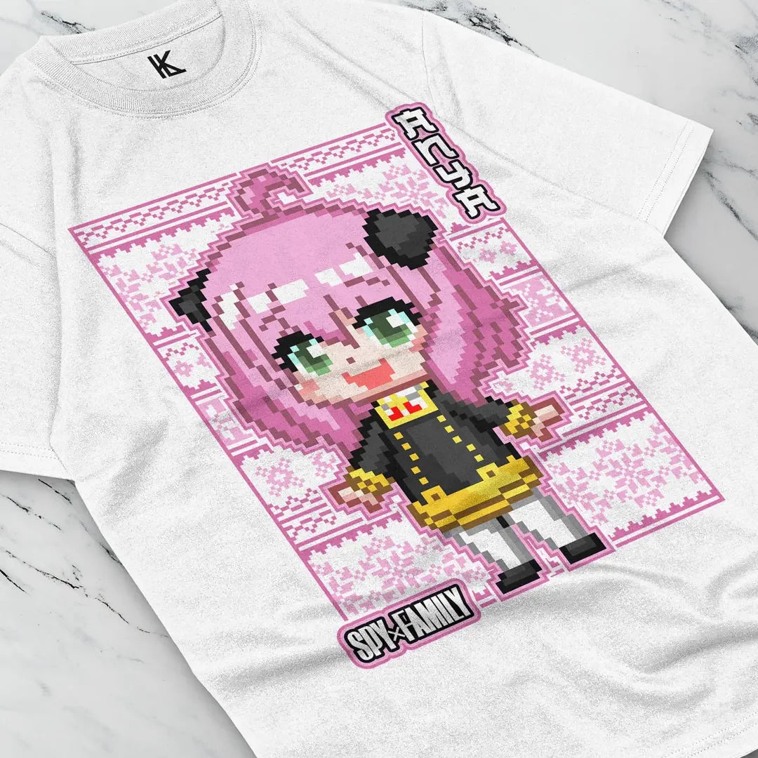 Here at Everythinganimee we have the best anime shirts in the world.
Embrace the cuteness of SPY x FAMILY with this pixelated Anya tee! Featuring Anya Forger in an adorable 8-bit style, this design perfectly blends nostalgia with the charm of everyone's favorite telepath.