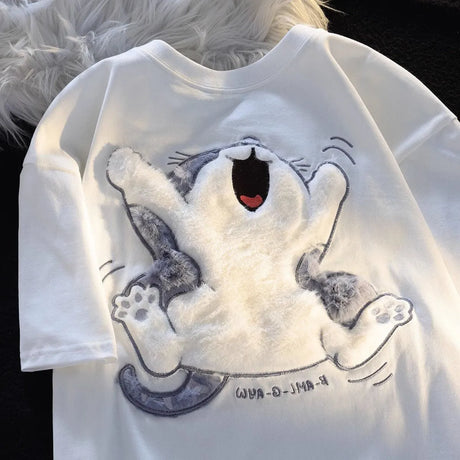 Dive into a world where cute meets comfort with our Cat Plush T-shirt. If you are looking for more Cat Anime Merch, We have it all!| Check out all our Anime Merch now!