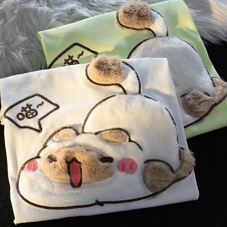 Dive into a world where cute meets comfort with our Cat Plush Embroidered T-shirt. If you are looking for more Cat Anime Merch, We have it all!| Check out all our Anime Merch now!