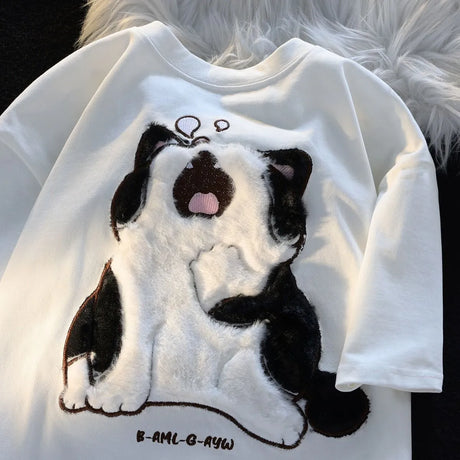 Dive into a world where cute meets comfort with our Cat Plush Embroidered T-shirt. If you are looking for more Cat Anime Merch, We have it all!| Check out all our Anime Merch now!
