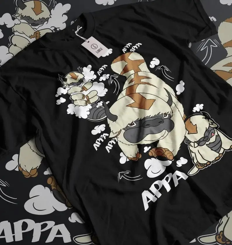 Here at Everythinganimee we have the best anime shirts in the world.
Soar with the iconic Appa on this fun and nostalgic tee, perfect for fans of the beloved flying bison. With a playful design that captures Appa’s adventurous spirit and charm, this shirt brings a vintage touch to your anime wardrobe.