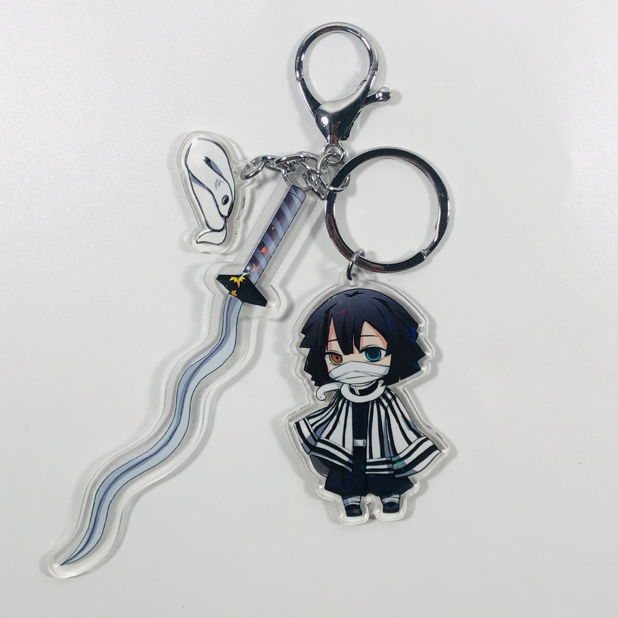 This keychains captures the magic of Demon Slayer. If you're looking for more Demon Slayer merch, we have it all! Check out our anime merch now—free shipping!