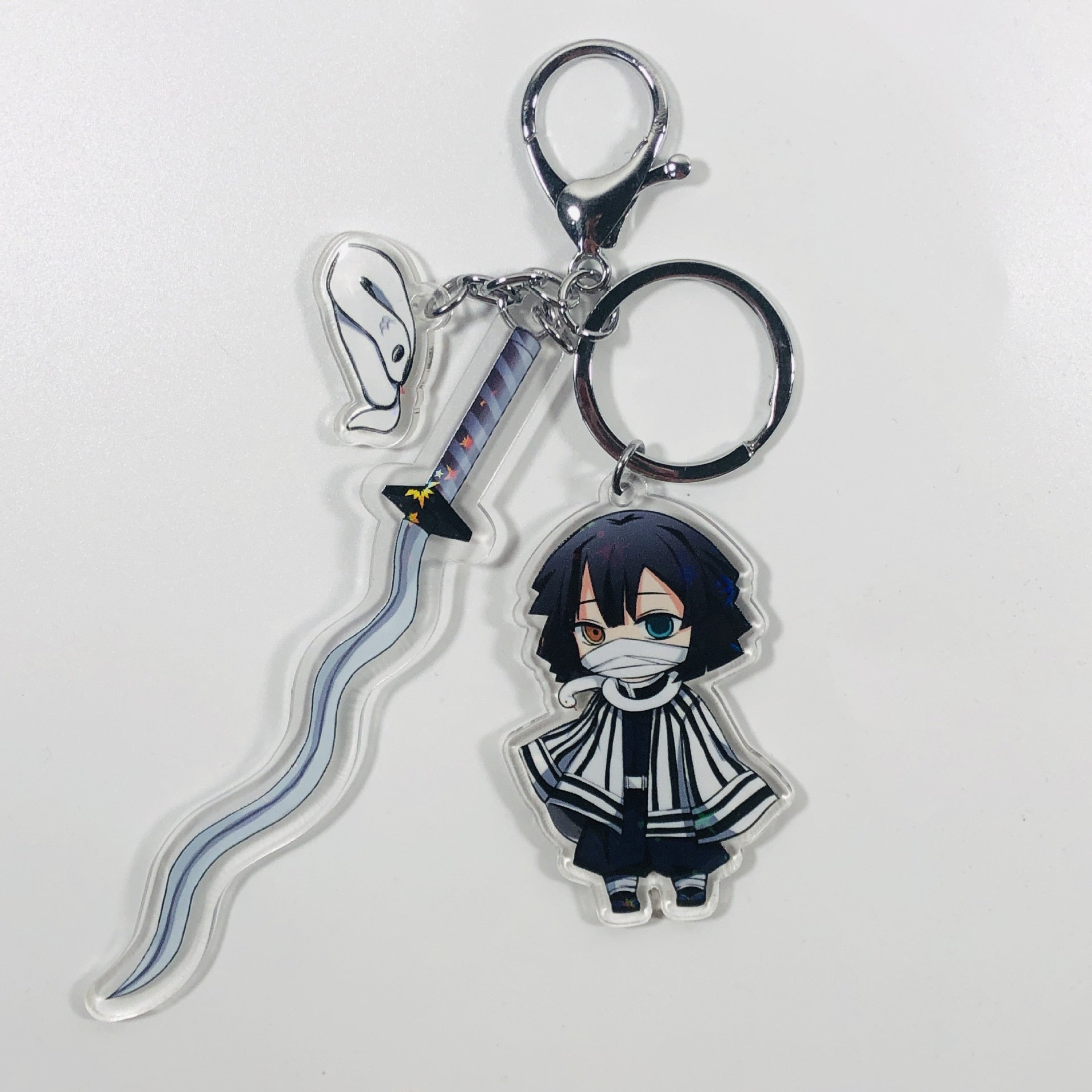 This keychains captures the magic of Demon Slayer. If you're looking for more Demon Slayer merch, we have it all! Check out our anime merch now—free shipping!
