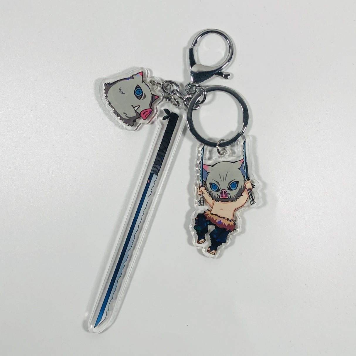 This keychains captures the magic of Demon Slayer. If you're looking for more Demon Slayer merch, we have it all! Check out our anime merch now—free shipping!