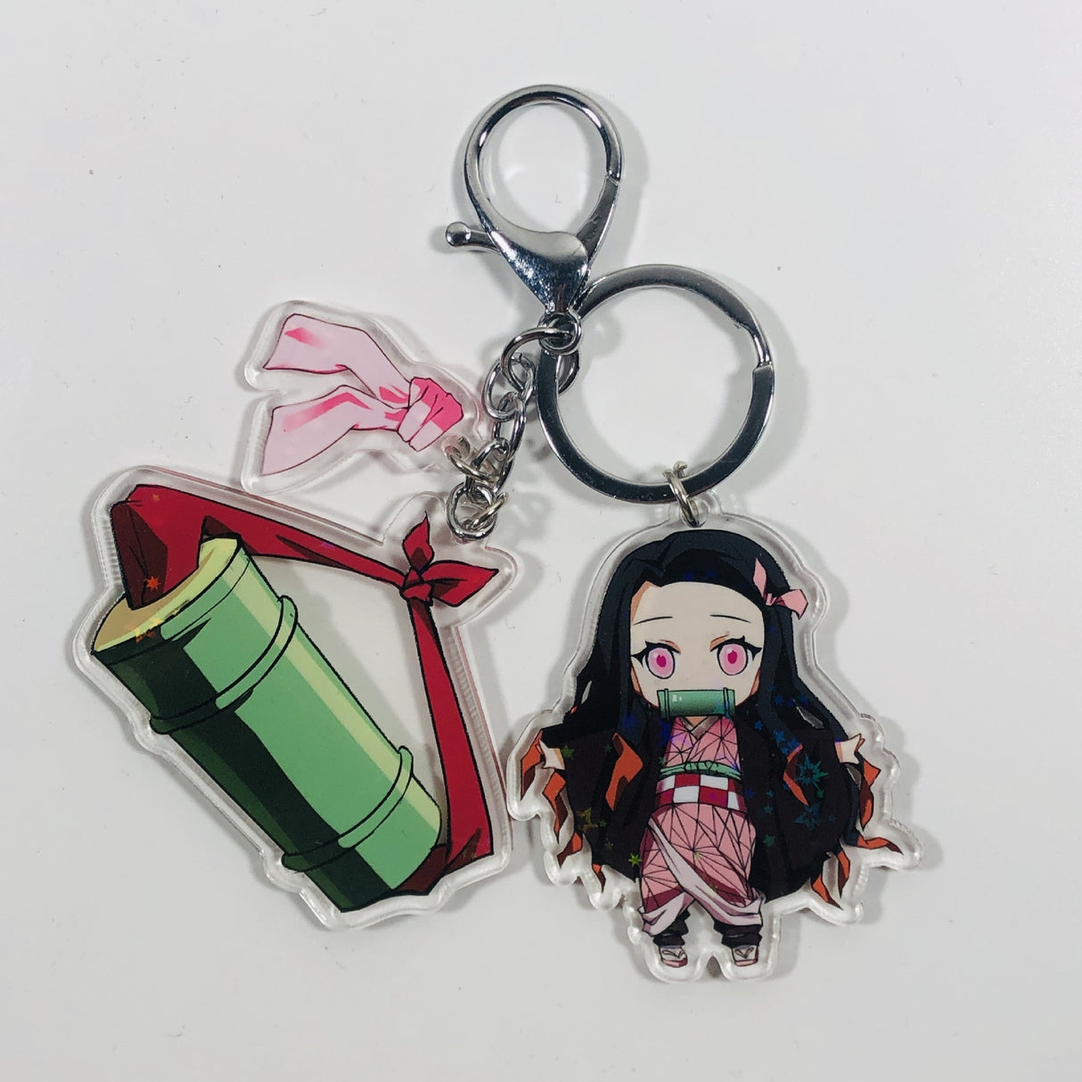This keychains captures the magic of Demon Slayer. If you're looking for more Demon Slayer merch, we have it all! Check out our anime merch now—free shipping!