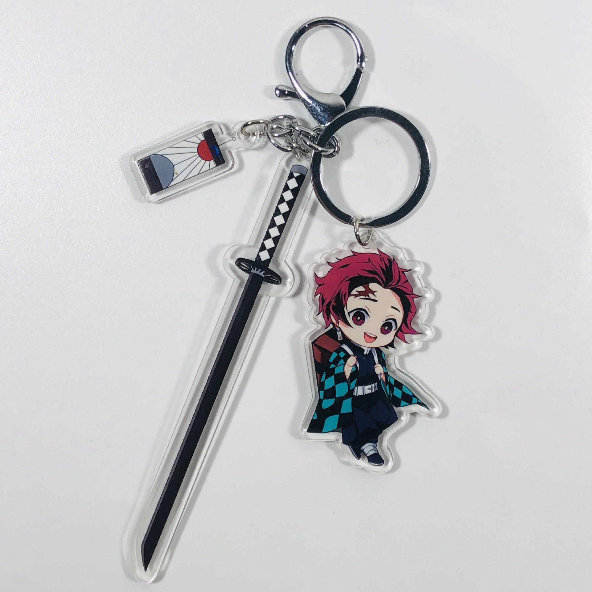 This keychains captures the magic of Demon Slayer. If you're looking for more Demon Slayer merch, we have it all! Check out our anime merch now—free shipping!