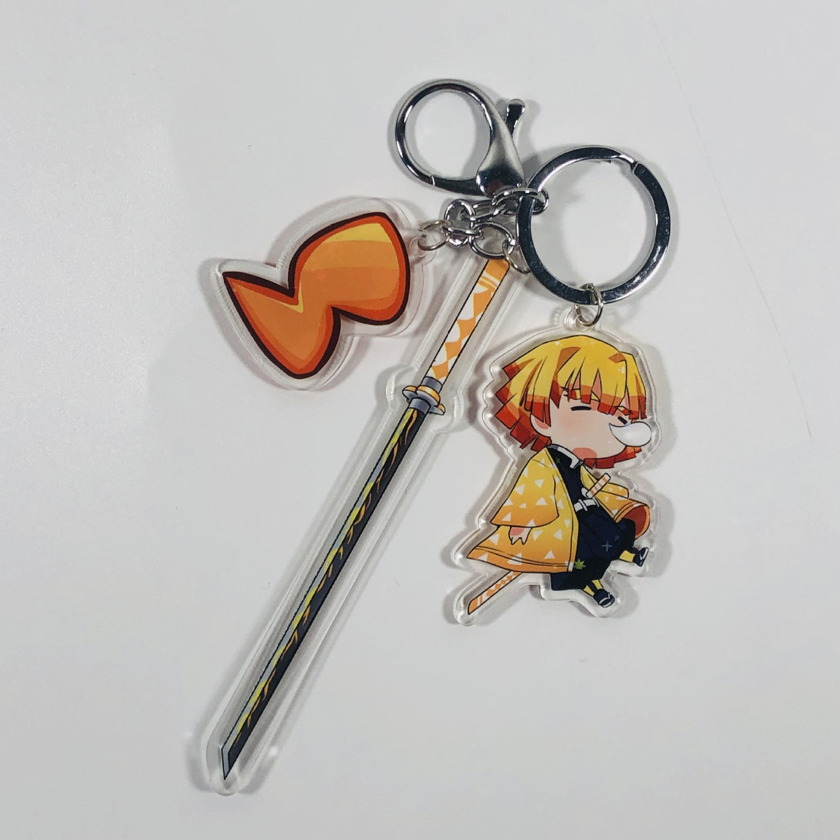 This keychains captures the magic of Demon Slayer. If you're looking for more Demon Slayer merch, we have it all! Check out our anime merch now—free shipping!
