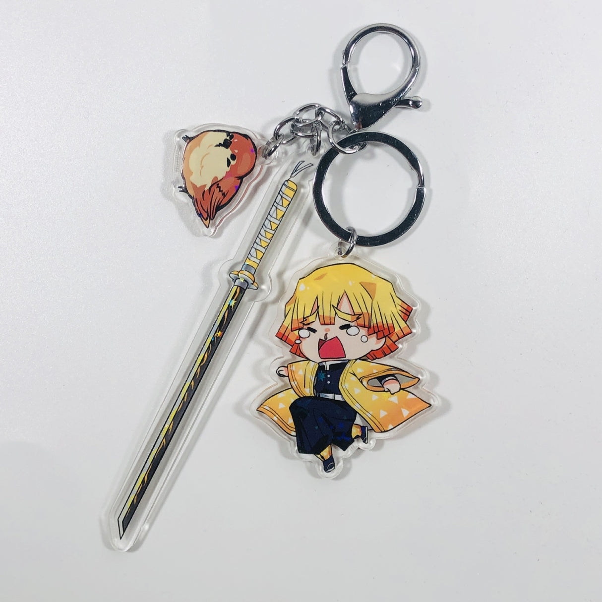 This keychains captures the magic of Demon Slayer. If you're looking for more Demon Slayer merch, we have it all! Check out our anime merch now—free shipping!