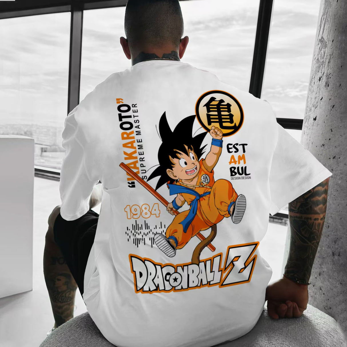 Here at Everythinganimee we only have the best shirts in the world! Relive the early days of Dragon Ball Z with the Kid Goku Retro Adventure Tee, celebrating Goku’s spirited beginnings. Featuring a nostalgic design of young Goku in his classic orange gi, this tee blends playful vintage style with modern streetwear flair. 