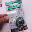 Travel back in time with our Kamen Rider Legacy Tamagotchi - Bandai's 50th Anniversary Edition | Here at Everythinganimee we have the worlds best anime merch | Free Global Shipping