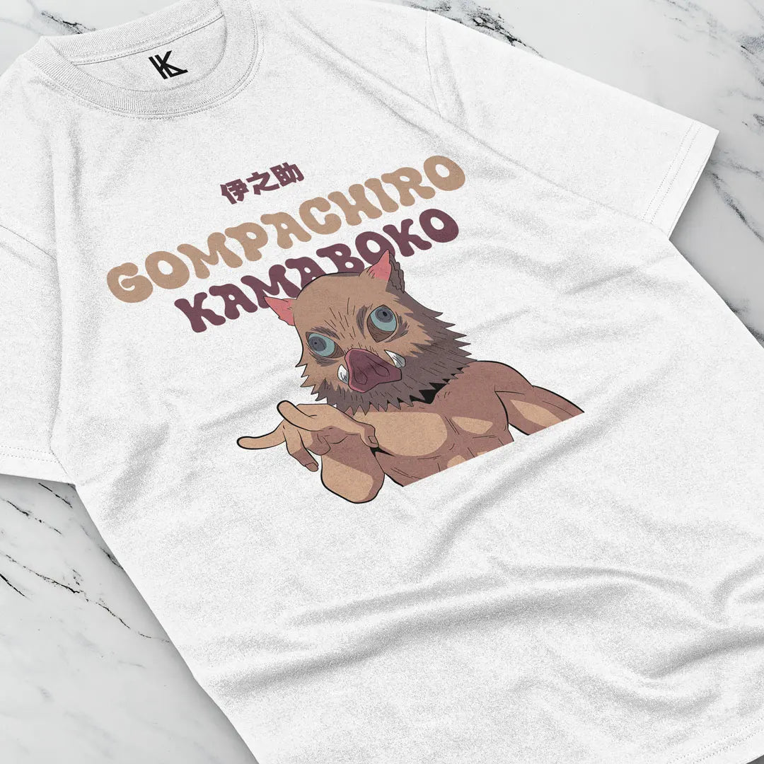 Here at Everythinganimee we have the best anime shirts in the world.
For fans of Demon Slayer and the wild, unpredictable Inosuke, this Gompatchiro Kamaboko tee is a must-have. Featuring Inosuke in his iconic boar mask and fierce stance, this design highlights his untamed energy and quirky character.