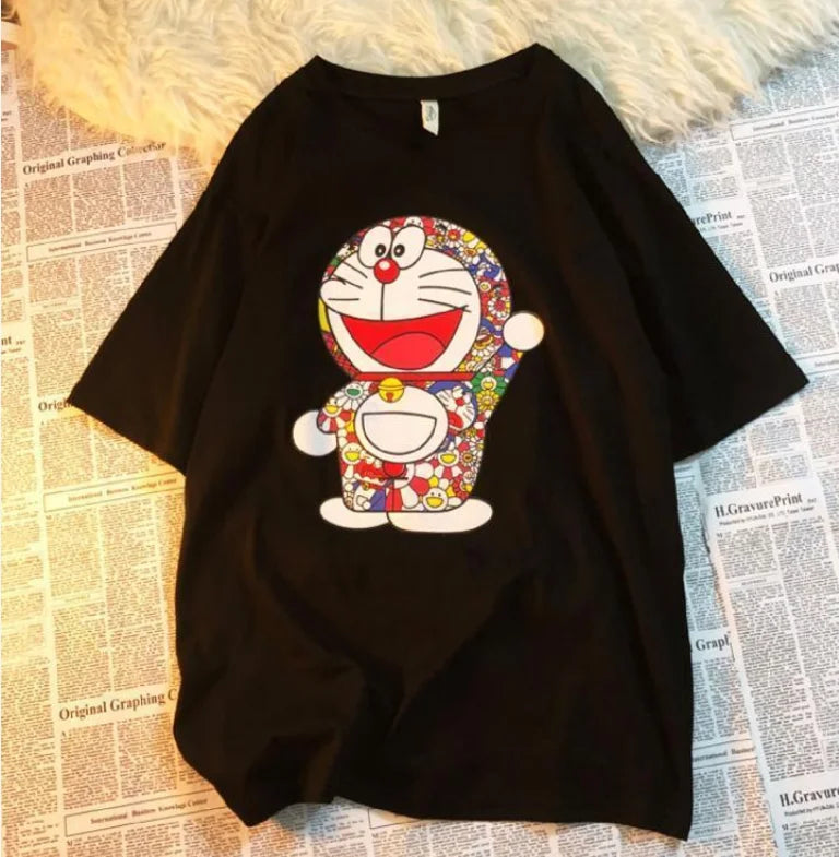 This tee captures the magic of Doraemon . If you're looking for more Doraemon merch, we have it all! Check out our anime merch now—free shipping!