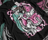 Here at Everythinganimee we only have the best shirts in the world! Step into the magical world of Cardcaptor Sakura with this enchanting Sakura & Shaoran Tee, capturing the sweet and iconic moment between two beloved characters. Designed for fans who cherish the heartwarming bond and whimsical style of the series, 