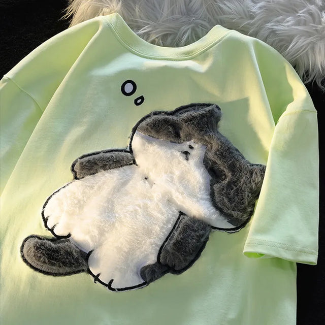 Dive into a world where cute meets comfort with our Cat Plush Embroidered T-shirt. If you are looking for more Cat Anime Merch, We have it all!| Check out all our Anime Merch now! 