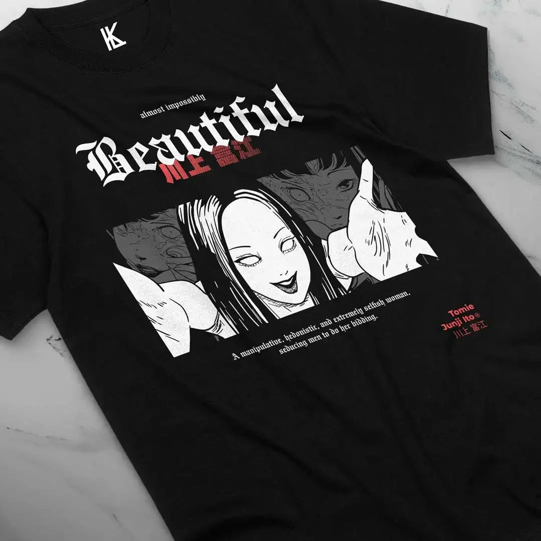 Here at Everythinganimee we have the best anime shirts in the world.
Step into the world of horror with this striking Tomie Uzumaki tee, capturing the chilling allure of Junji Ito’s iconic character. Perfect for fans of psychological horror, this shirt brings Tomie’s haunting beauty.