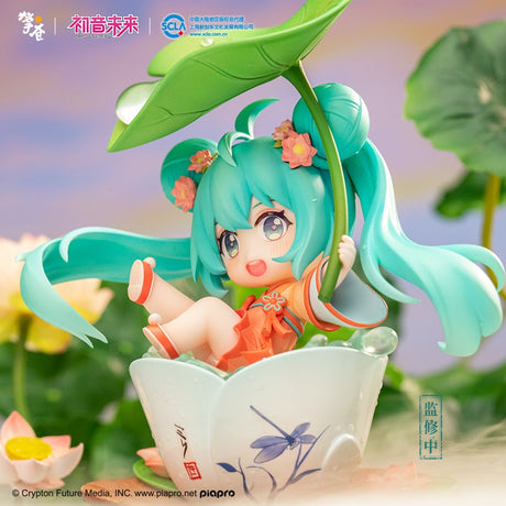 Explore Miku figure, adorned with floral patterns complementing a traditionally designed Japanese teacup. If you are looking for more Vocaloid, We have it all! | Check out all our Anime Merch now!