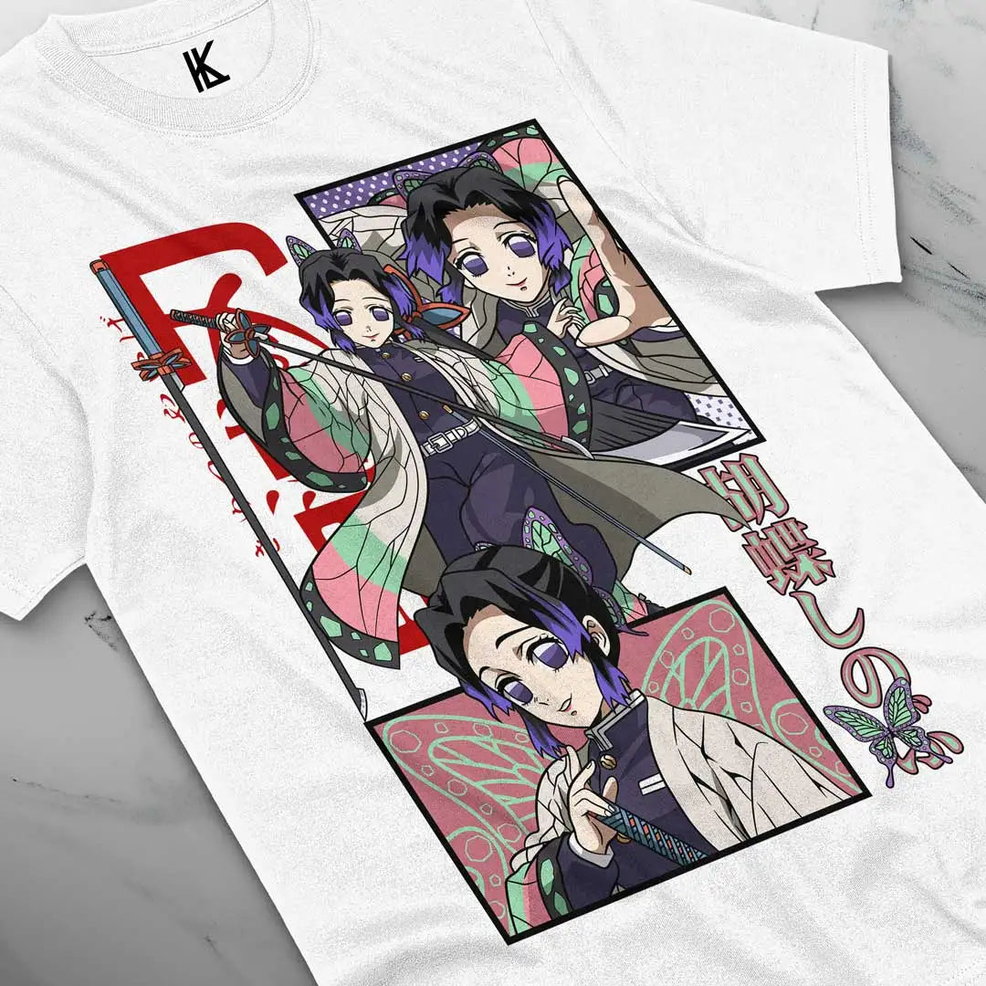 Here at Everythinganimee we have the best anime shirts in the world.
Embrace the grace and strength of Shinobu Kocho from Demon Slayer with this stunning tee. Featuring vibrant artwork that highlights her unique style and elegance, this shirt is a perfect addition to any fan's collection.