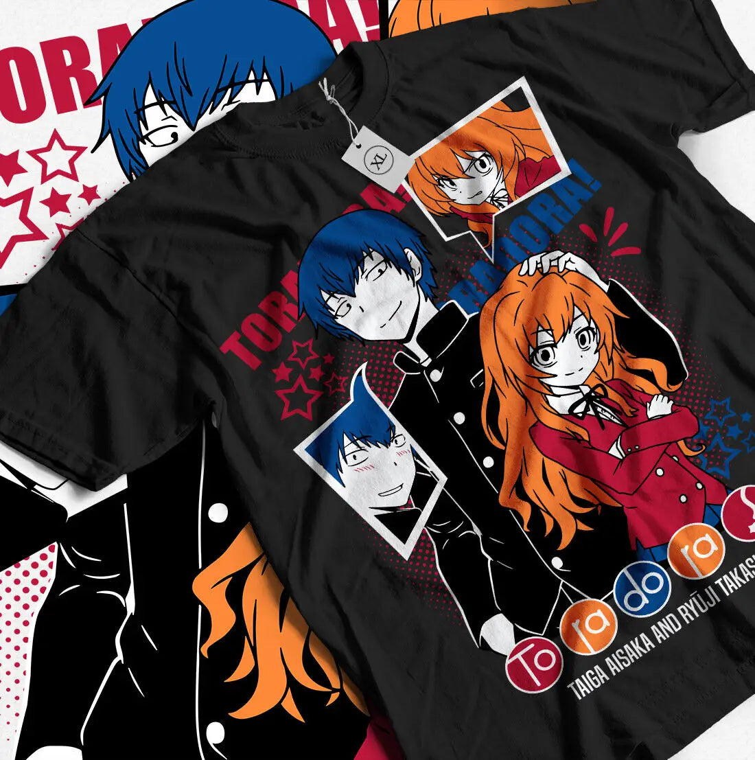 Here at Everythinganimee we have the best anime shirts in the world. 
Celebrate the iconic duo of Taiga Aisaka and Ryuuji Takasu with this vibrant Toradora tee.