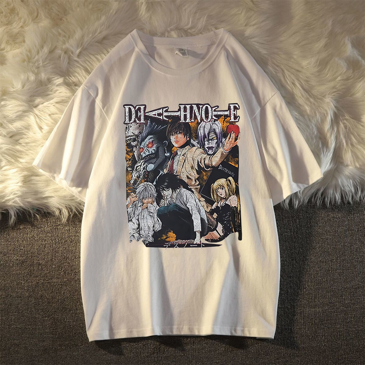 Dive into the dark world of Death Note with this striking Death Note T-Shirt. Here at Everythinganimee we have only the best anime merch! Free Global Shipping.