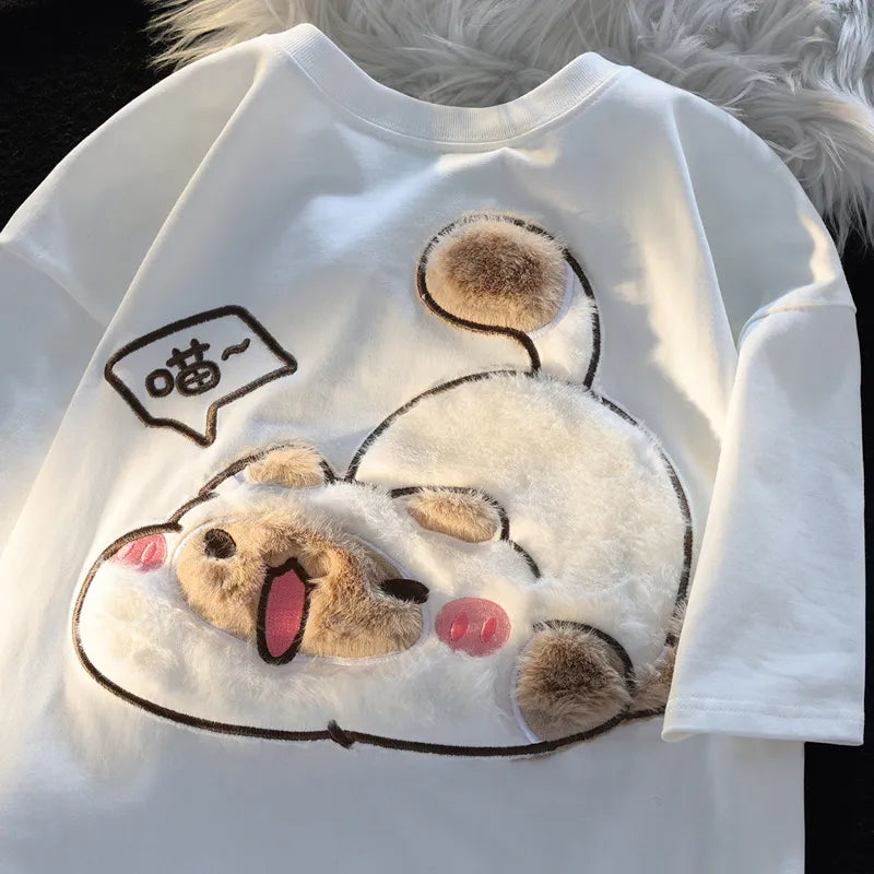 Dive into a world where cute meets comfort with our Cat Plush Embroidered T-shirt. If you are looking for more Cat Anime Merch, We have it all!| Check out all our Anime Merch now! 