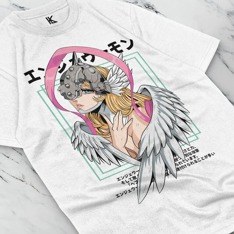 Here at Everythinganimee we have the best anime shirts in the world.
Embrace the mystical power of the Digital World with the Celestial Digimon Tee, featuring one of the most iconic angelic Digimon. This design captures her grace and strength.