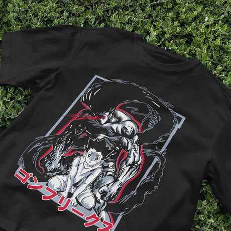 Here at Everythinganimee we have the best anime shirts in the world.
Unleash the thrill of adventure with this captivating anime graphic tee. Featuring a dynamic duo in a high-stakes moment, this shirt is perfect for fans who live for intense anime scenes.