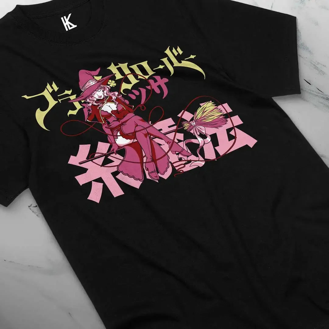 Here at Everythinganimee we have the best anime shirts in the world.
Step into the magical world of Black Clover with this Vanessa Enchantress Tee, celebrating the charming and powerful witch Vanessa Enoteca. This captivating design highlights Vanessa’s confident pose and her signature style.