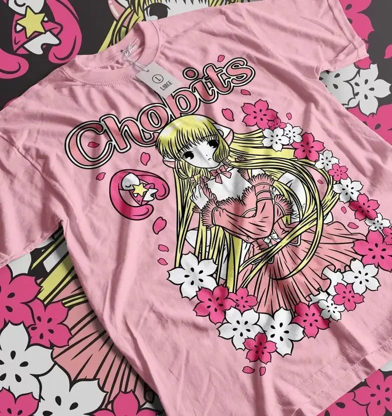 Here at Everythinganimee we have the best anime shirts in the world. 
Embrace the elegance of Chobits with this stunning Chi Blossom Tee, featuring the beloved Chi surrounded by delicate cherry blossoms.