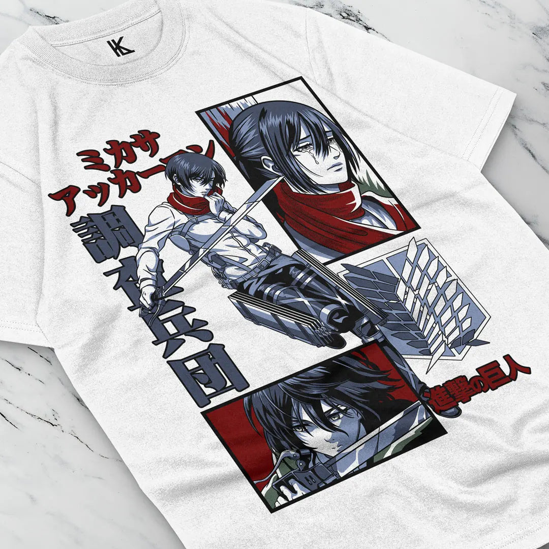 Here at Everythinganimee we have the best anime shirts in the world.
Step into the world of Attack on Titan with this intense Mikasa Ackerman tee, showcasing her fierce dedication and unmatched combat skills. 