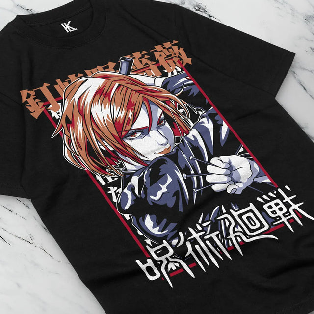 Immerse yourself in this striking Nobara Tee, perfect for anime fans. Looking for more Jujutsu Kaisen merch? Explore our full collection of anime merch now!