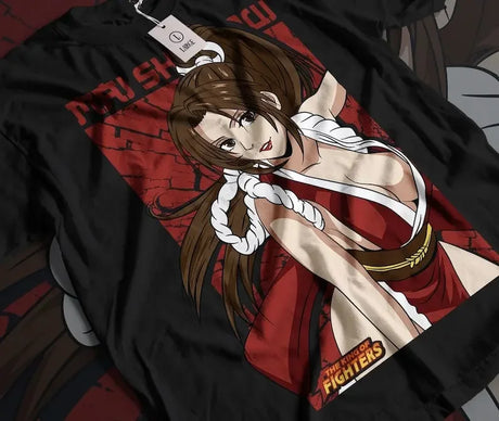 Here at Everythinganimee we have the best anime shirts in the world.
Celebrate the iconic beauty and fierce fighter Mai Shiranui from The King of Fighters 2002 with this stunning tee. The bold design showcases Mai in her classic fighting stance.