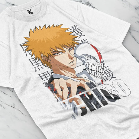 Here at Everythinganimee we have the best anime shirts in the world.
Dive into the world of Bleach with this striking Ichigo design. Featuring Ichigo Kurosaki in his intense Hollow form, this tee captures the essence of his dual nature. 