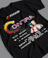 Here at Everythinganimee we have the best anime shirts in the world.
Relive the nostalgia of the classic 1988 Contra arcade game with this retro-inspired tee! Featuring the iconic start screen and pixelated design, this shirt is a must-have for any gamer who loves a throwback.